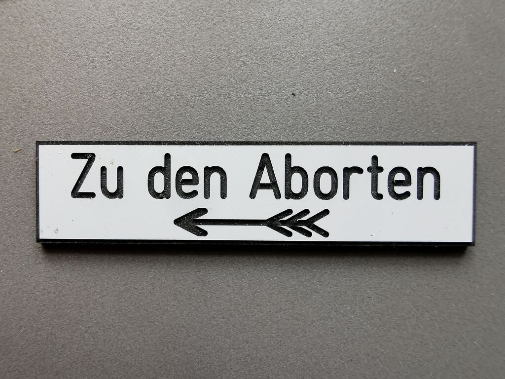 Zu den Aborten, nach links, Kunststoff 55 x 13 mm, 2-Schicht-Kunststoff