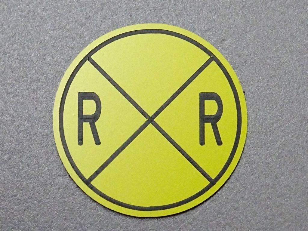 Railroad Crossing rund gelb/schwarz D = 35 mm, 2-Schicht-Kunststoff
