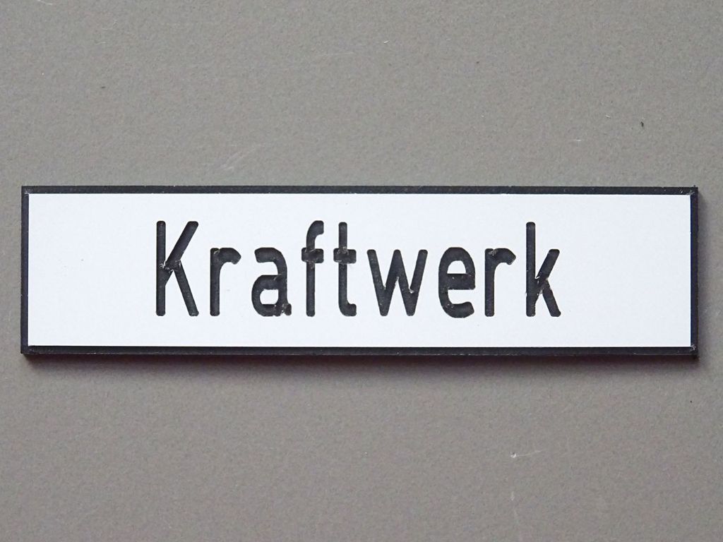 Kraftwerk, kleines Format 60 x 13 mm, 2-Schicht-Kunststoff